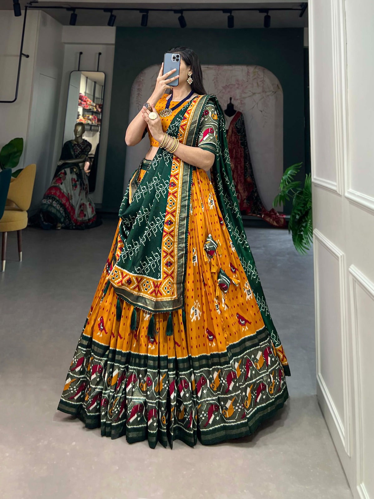 Mustard Tussar Silk Lehenga Choli with Enchanting Ikat Patola Print and Foil Work