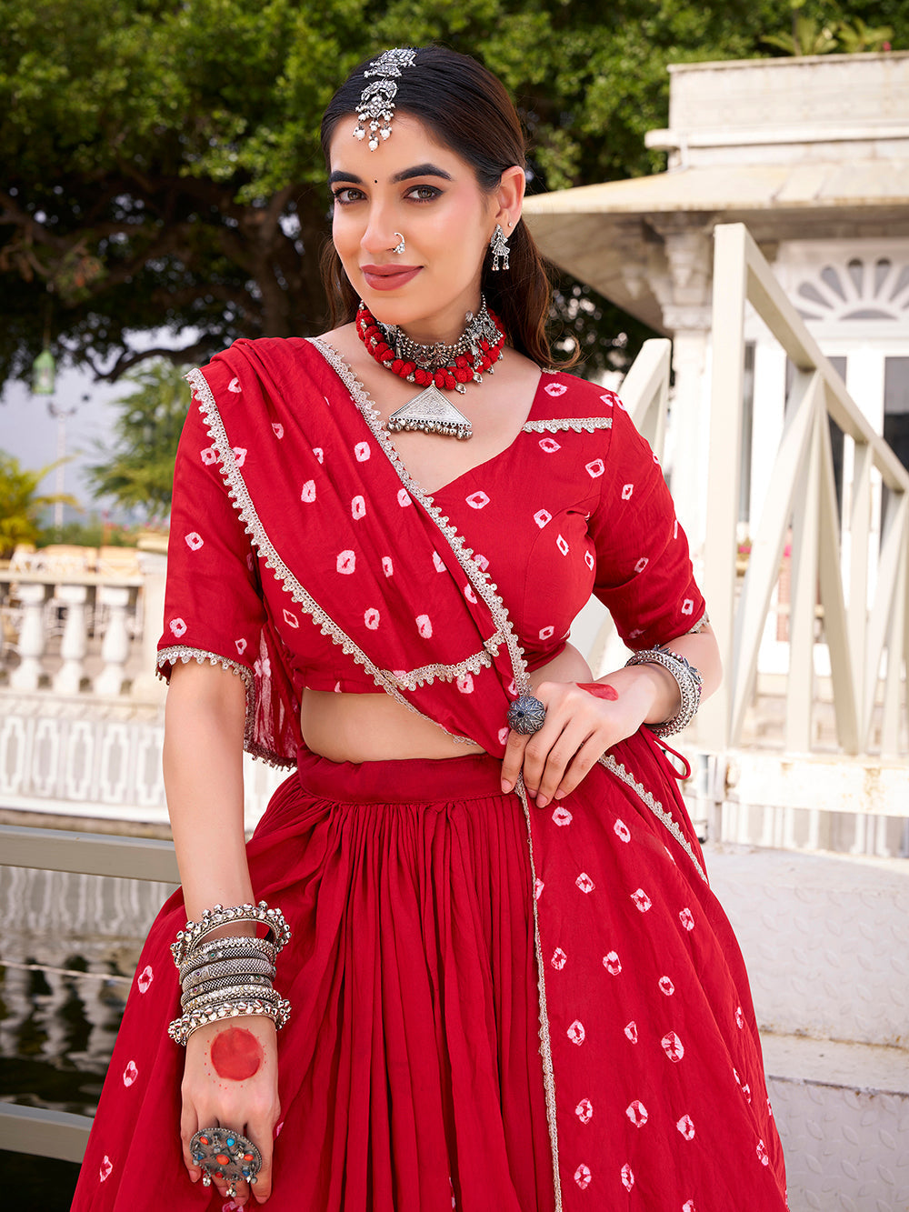 Red chanderi bandhej print chaniya choli with lace detailing 6 meter flair