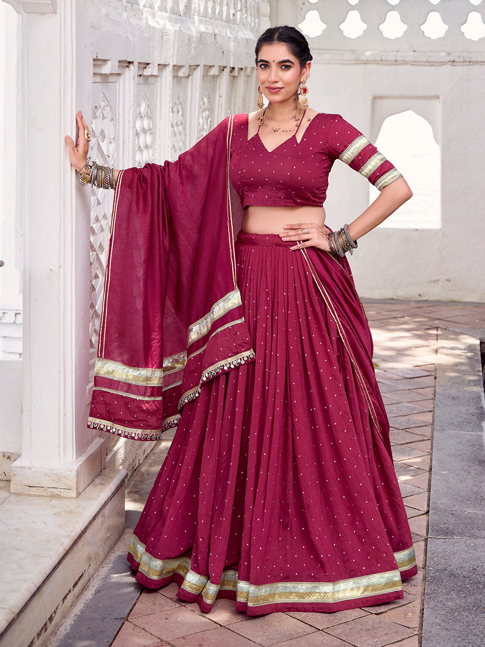 Maroon chanderi zari weaving lehenga choli with embossed lace dupatta