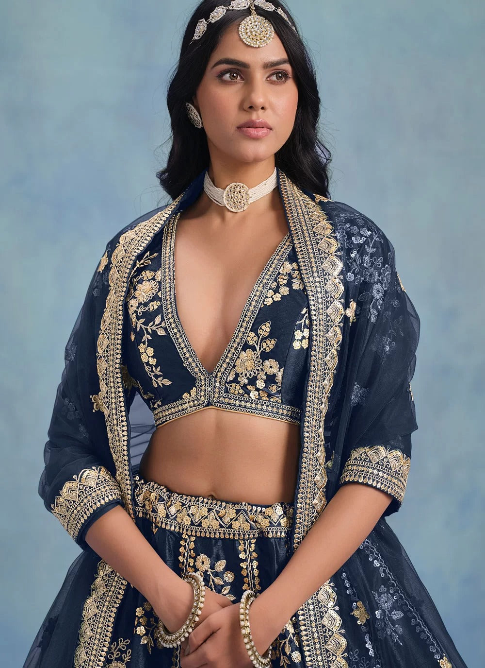 Navy blue embroidered art silk engagement lehenga with net dupatta