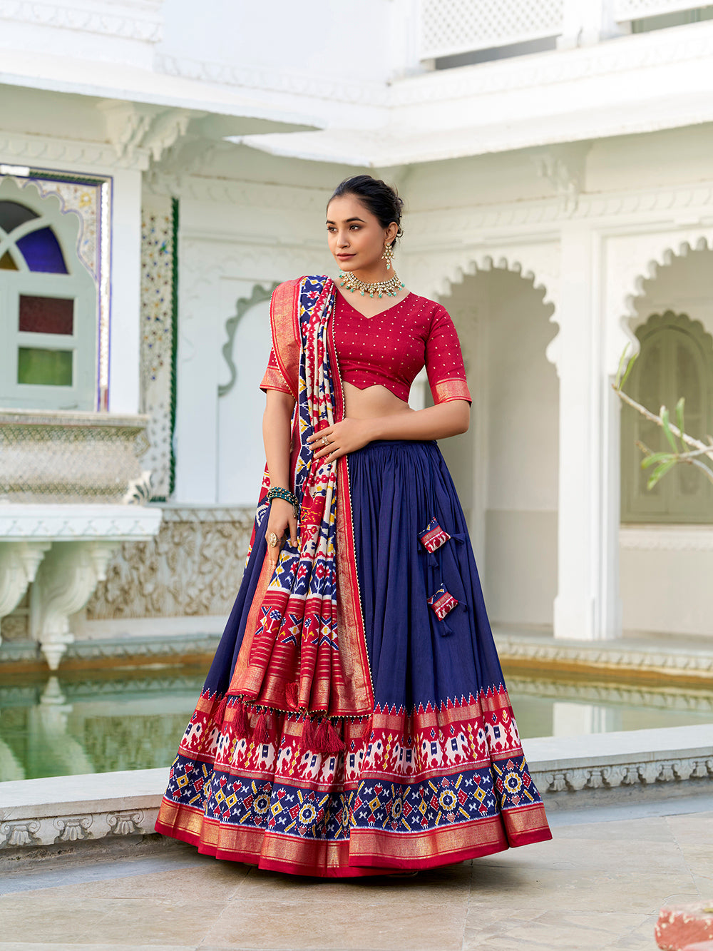 Navy blue tasar silk lehenga choli with ikkat patola print foil work