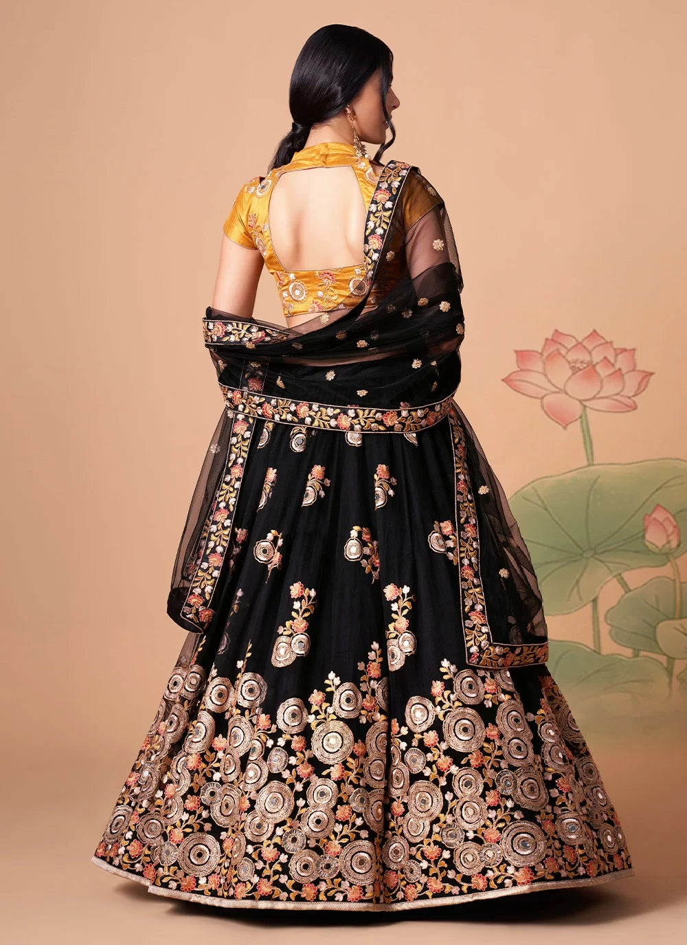 Net lehenga with sequins embroidery and mirror work in black