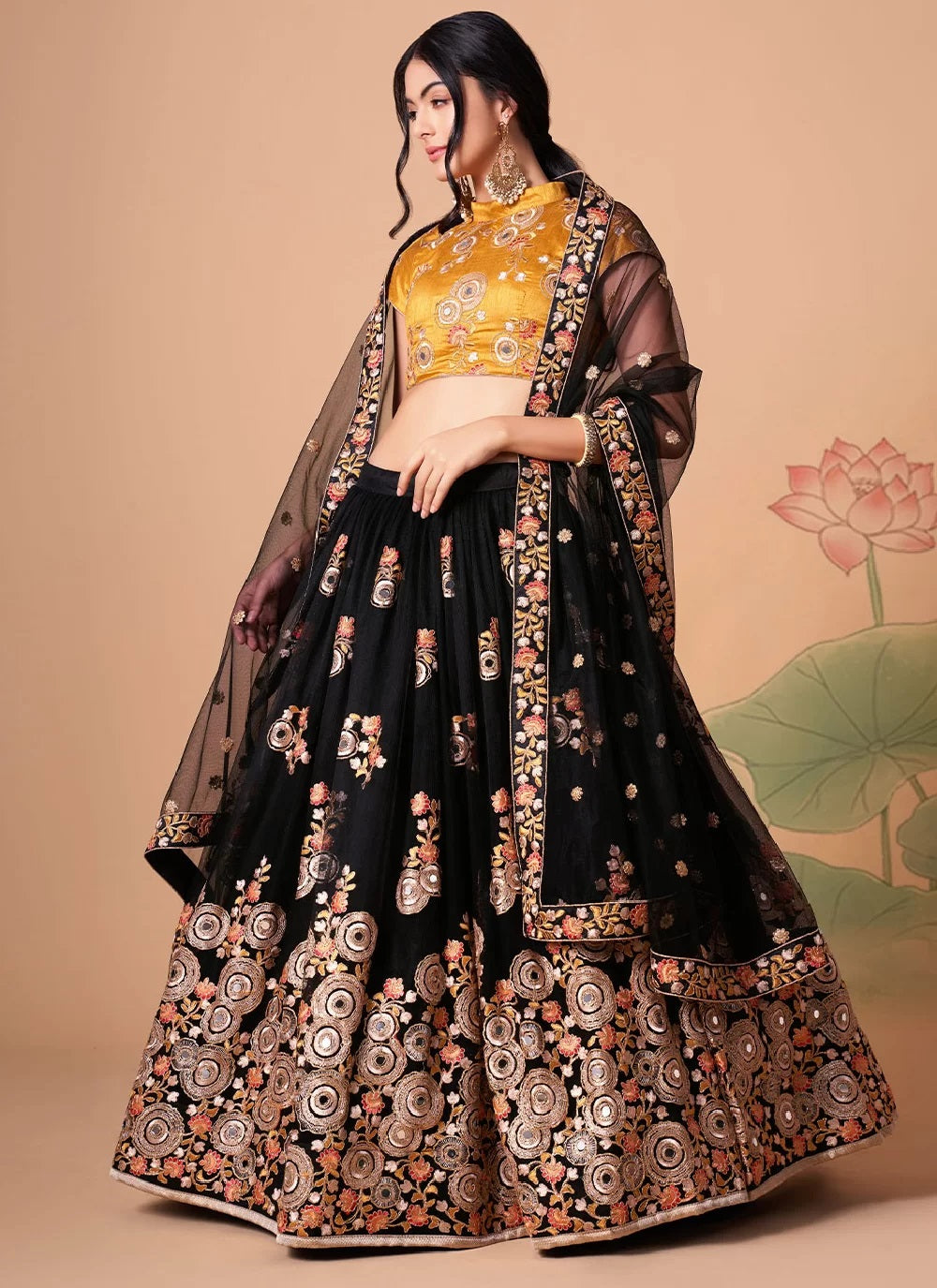 Net lehenga with sequins embroidery and mirror work in black