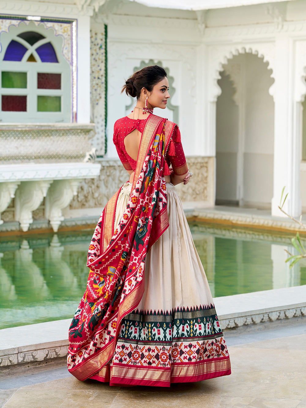 Off white tasar silk lehenga choli with hyderabadi patola print foil work