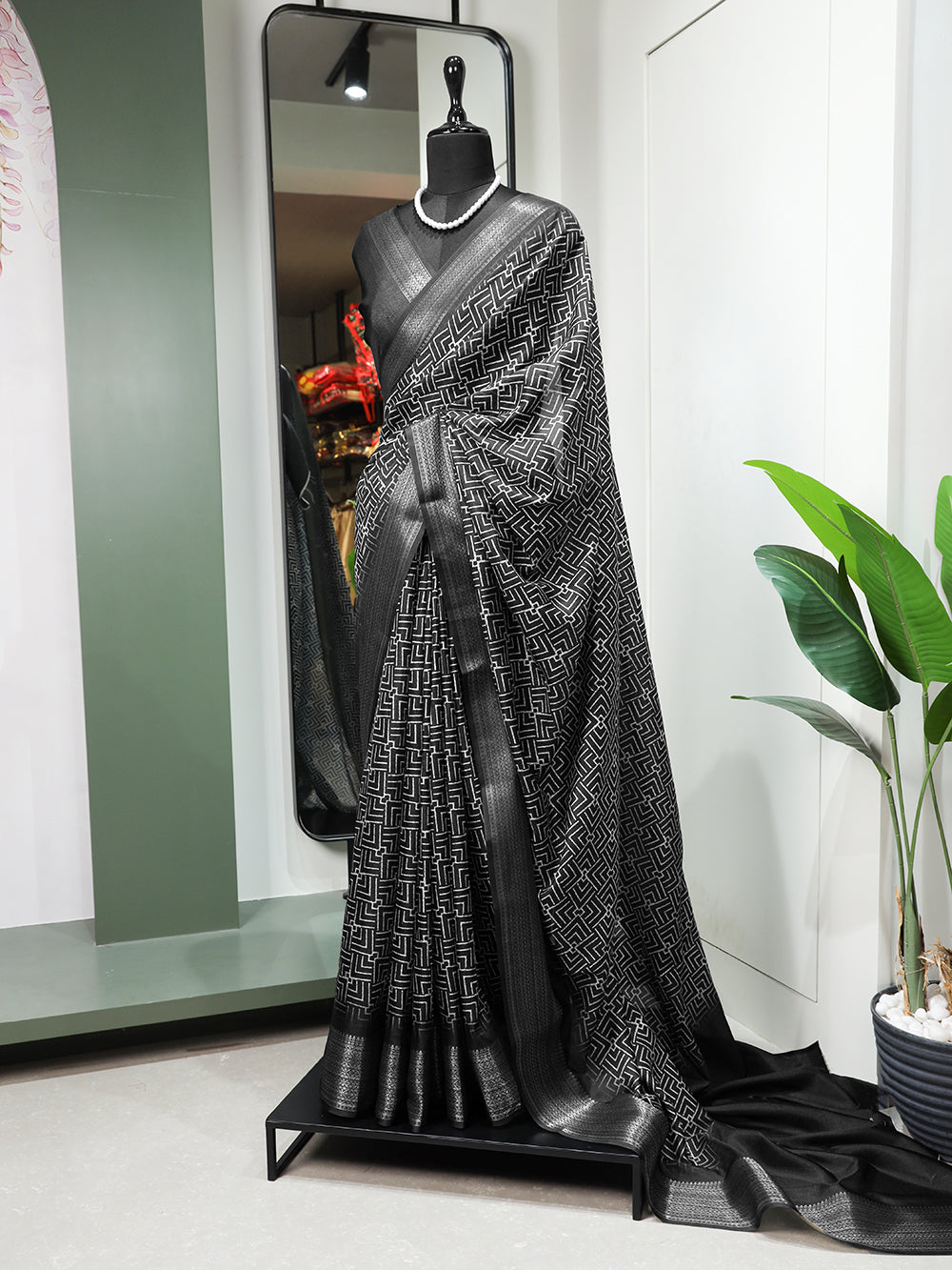 Black Color Printed With Zari Border Dola Silk Saree