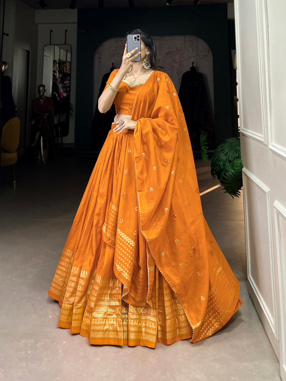 Vibrant orange chanderi silk lehenga choli with zari weaving matching dupatta