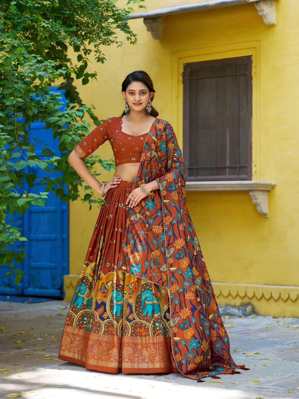 Rust orange color foil work lehenga choli