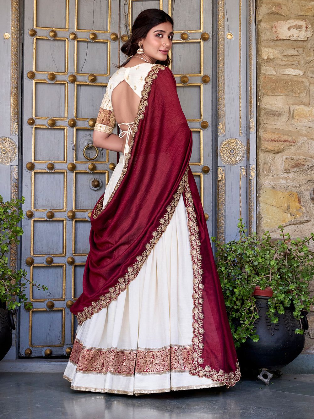 Off white vichitra silk zari weaving lehenga choli with sequin belt dupatta