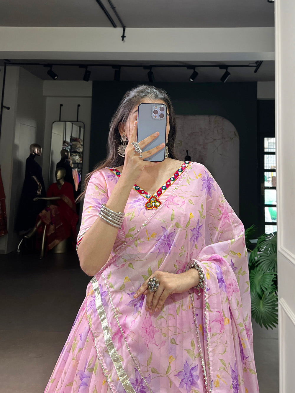 Baby pink tubby silk floral printed lehenga choli with mirror work embossed lace detailing