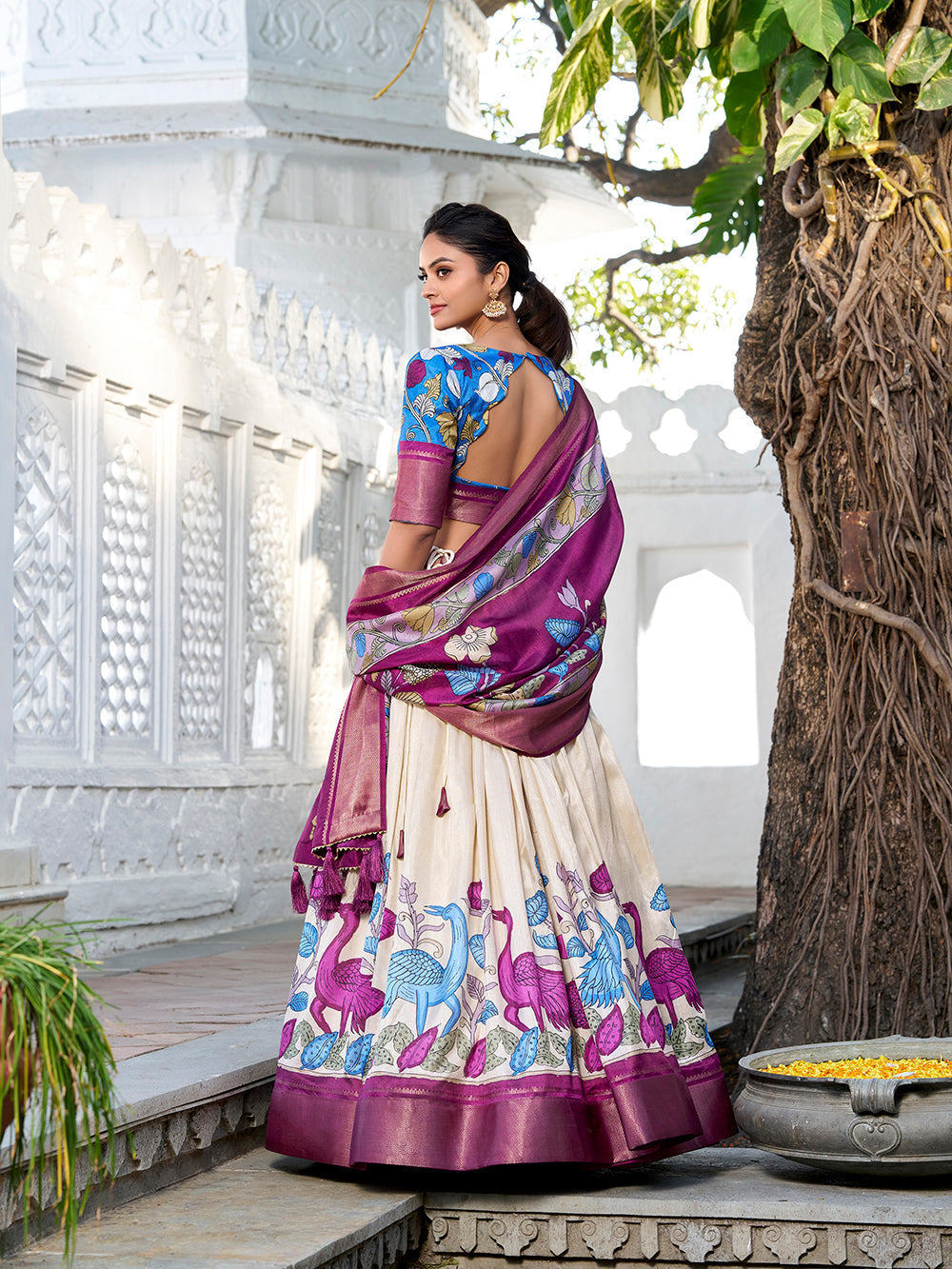 Off white color printed kalamkari with zari weaving border jacquard silk lehenga choli