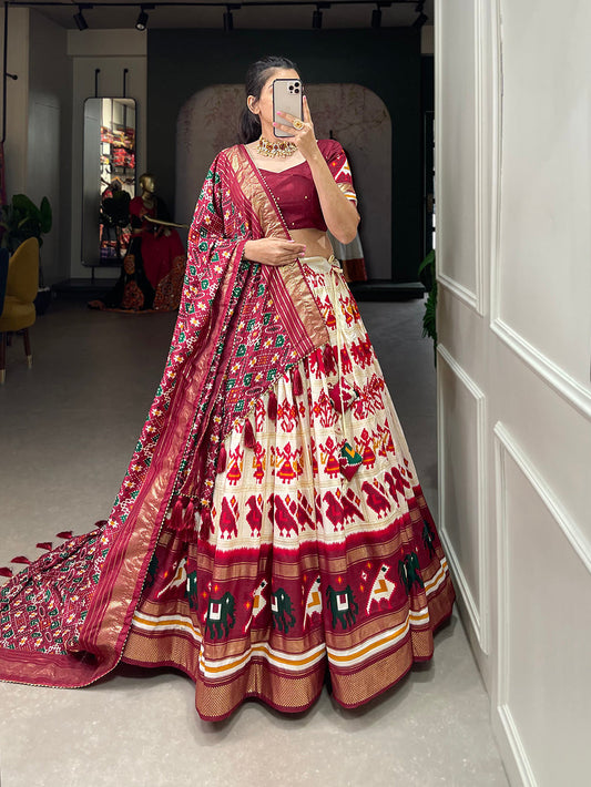 Off White Color Patola Printed With Foil Work Tussar Silk Lehenga Choli