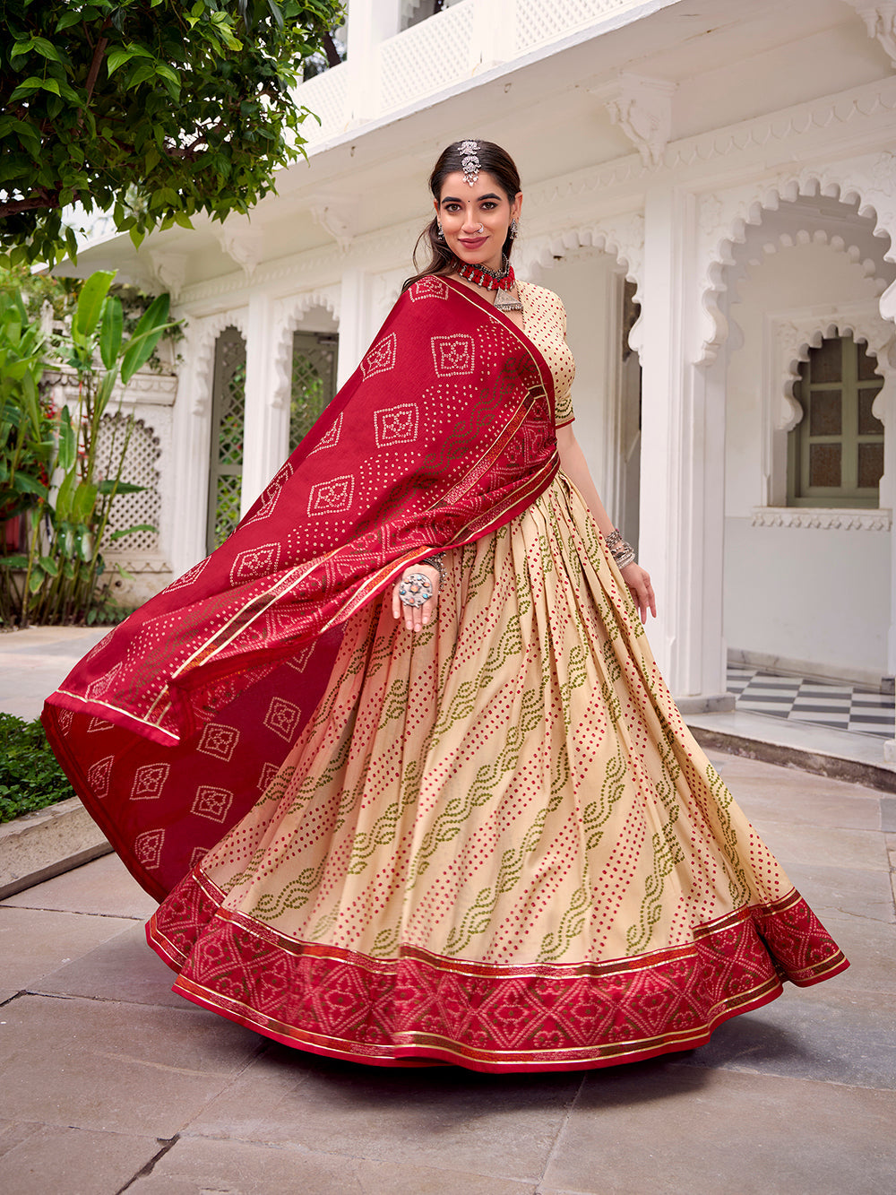 Off white tasar silk bandhej print lehenga choli with gotta patti lace work 4 meter flair