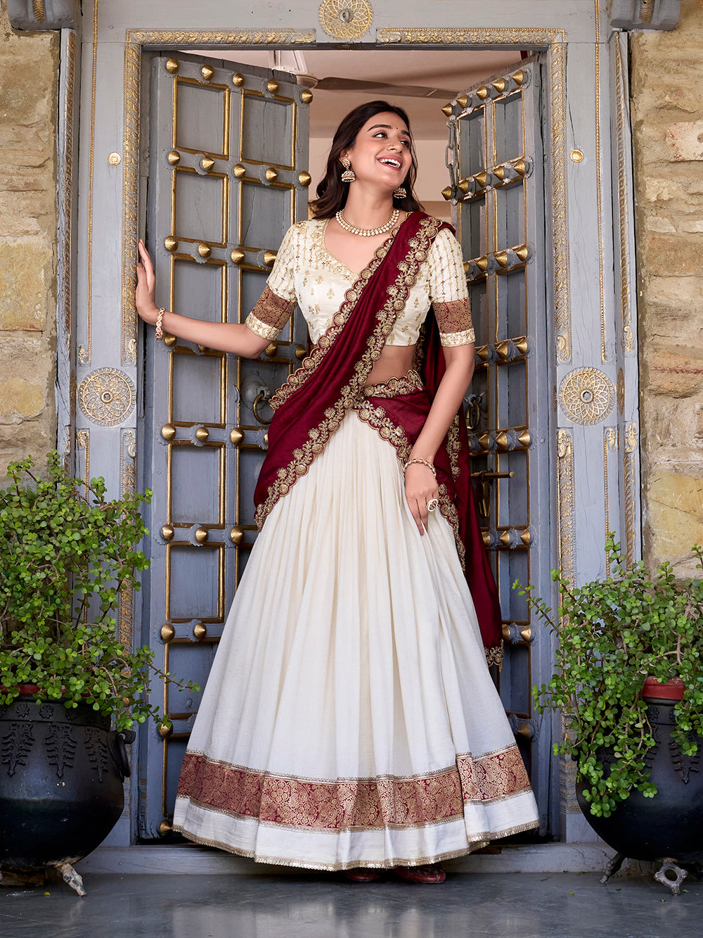 Off white vichitra silk zari weaving lehenga choli with sequin belt dupatta