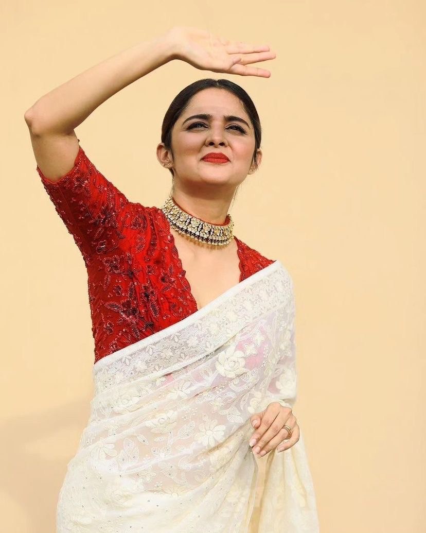 Off White Eye-Catching Bollywood Elegance: Rangoli Silk Saree with Sequined Blouse
