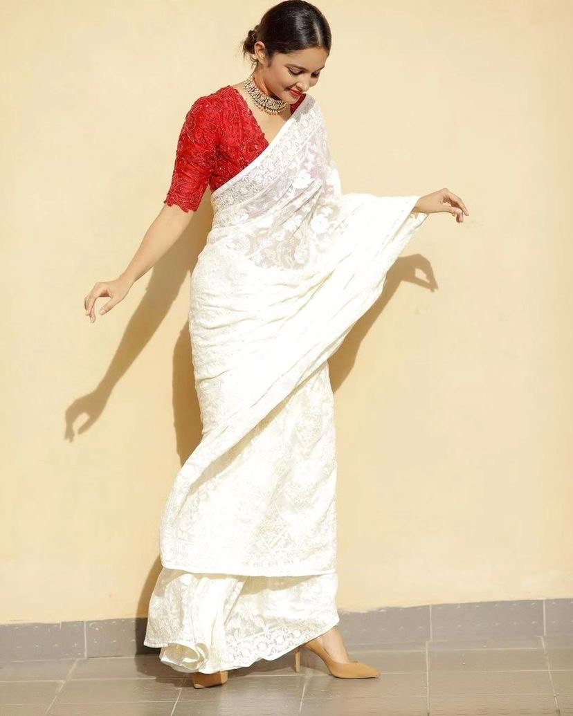 Off White Eye-Catching Bollywood Elegance: Rangoli Silk Saree with Sequined Blouse