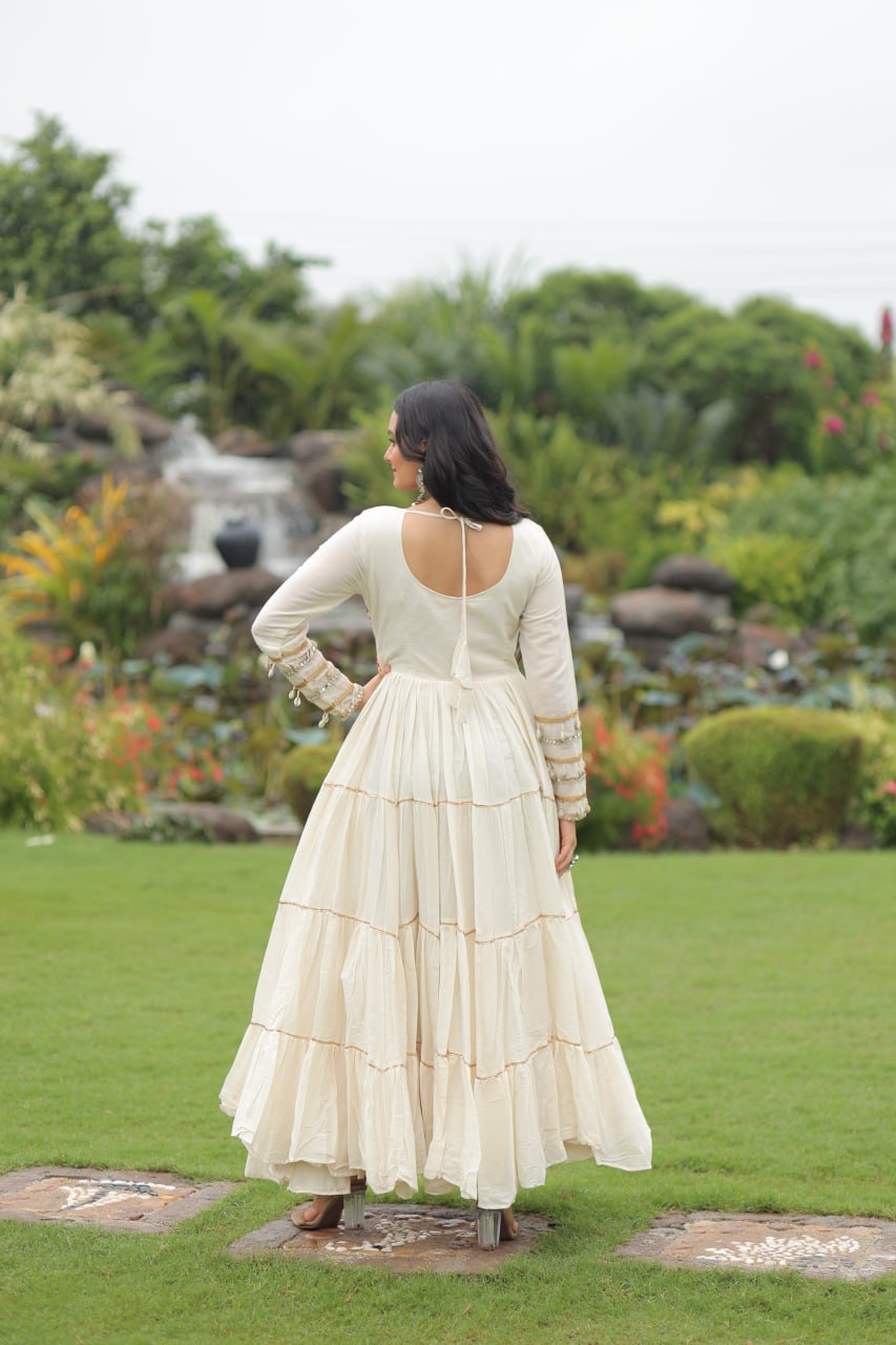 Off-White Navratri Special Kora Cotton Embroidered Gown with Gota Patti Work & 12 Meter Flair