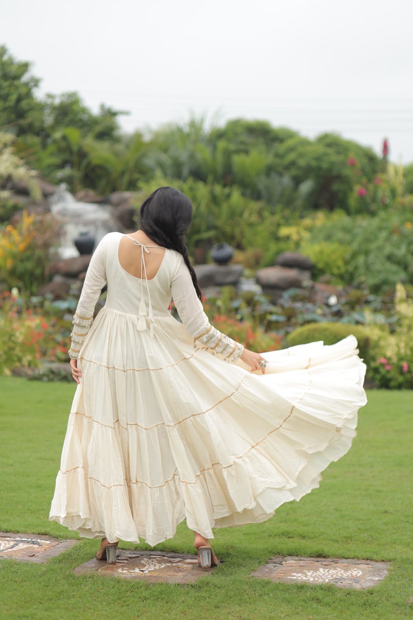 Off-White Navratri Special Kora Cotton Embroidered Gown with Gota Patti Work & 12 Meter Flair
