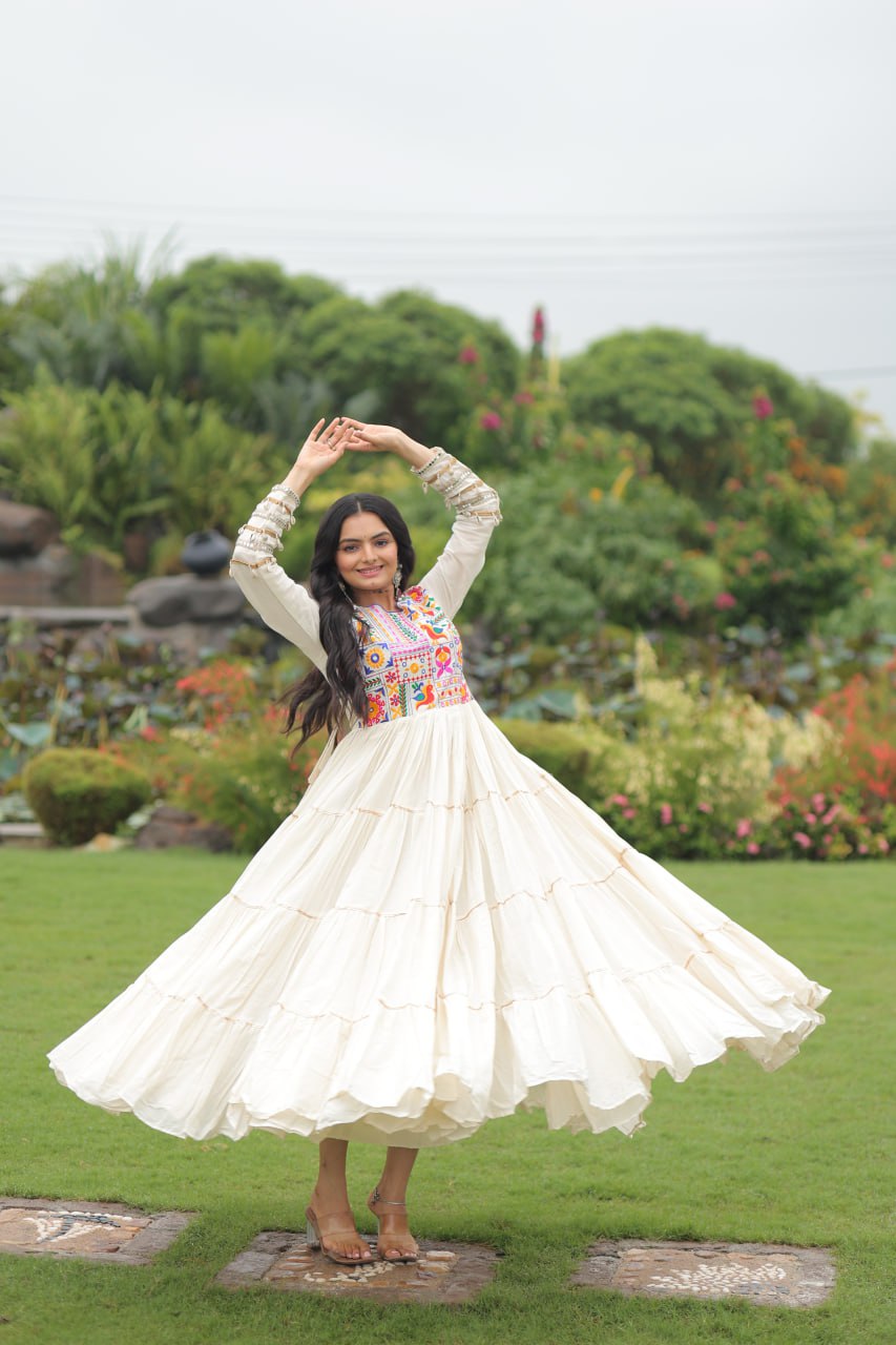 Off-White Navratri Special Kora Cotton Embroidered Gown with Gota Patti Work & 12 Meter Flair