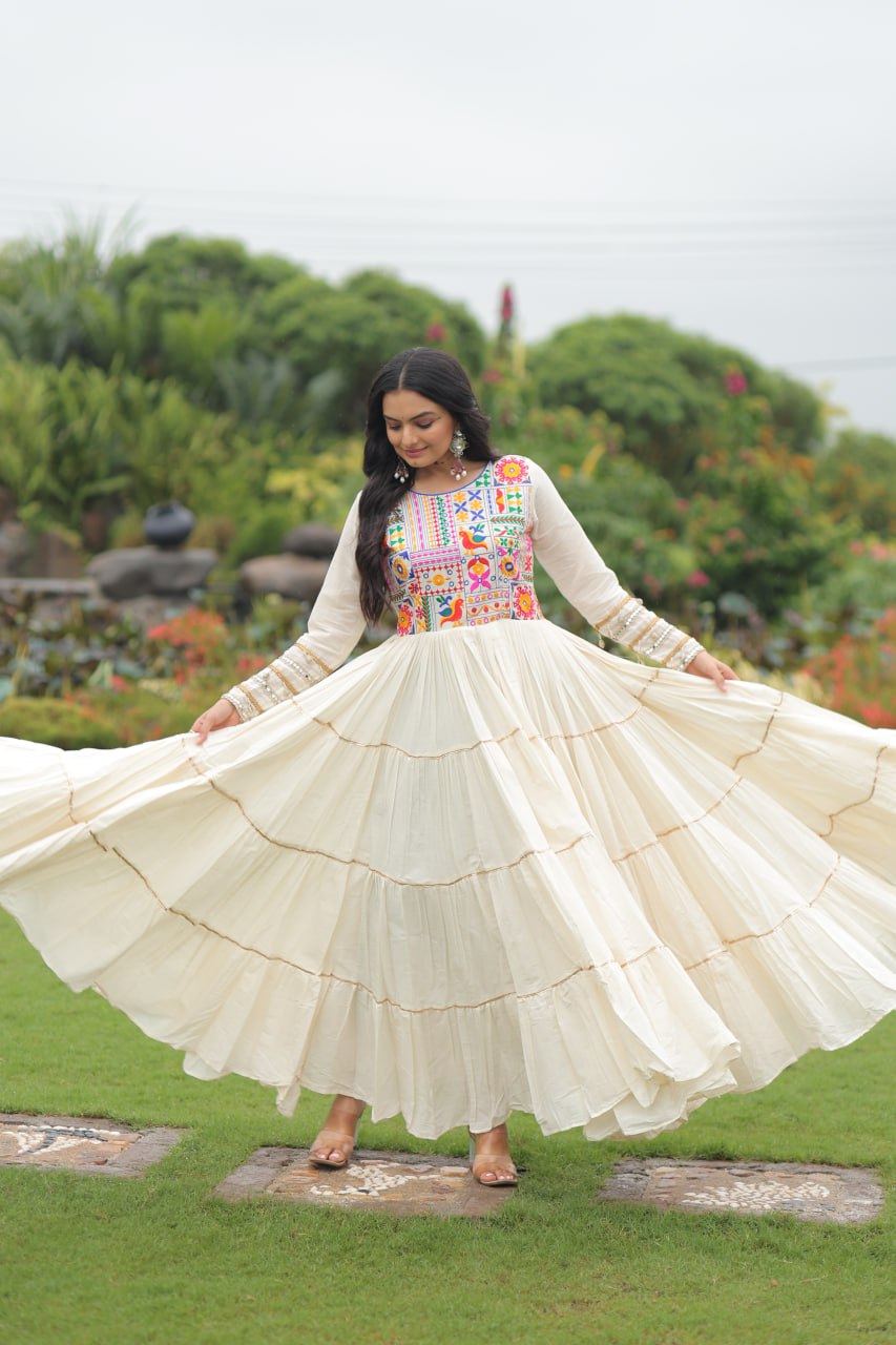 Off-White Navratri Special Kora Cotton Embroidered Gown with Gota Patti Work & 12 Meter Flair