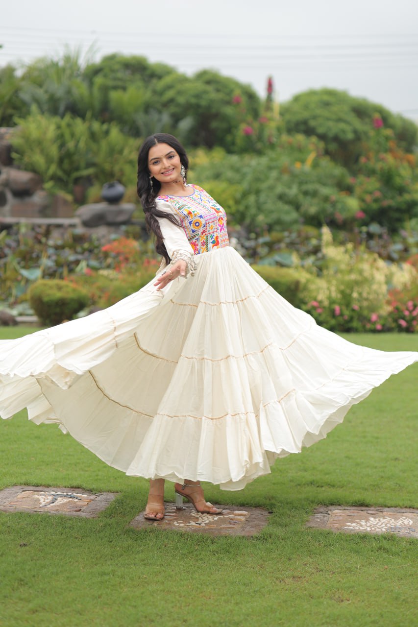 Off-White Navratri Special Kora Cotton Embroidered Gown with Gota Patti Work & 12 Meter Flair