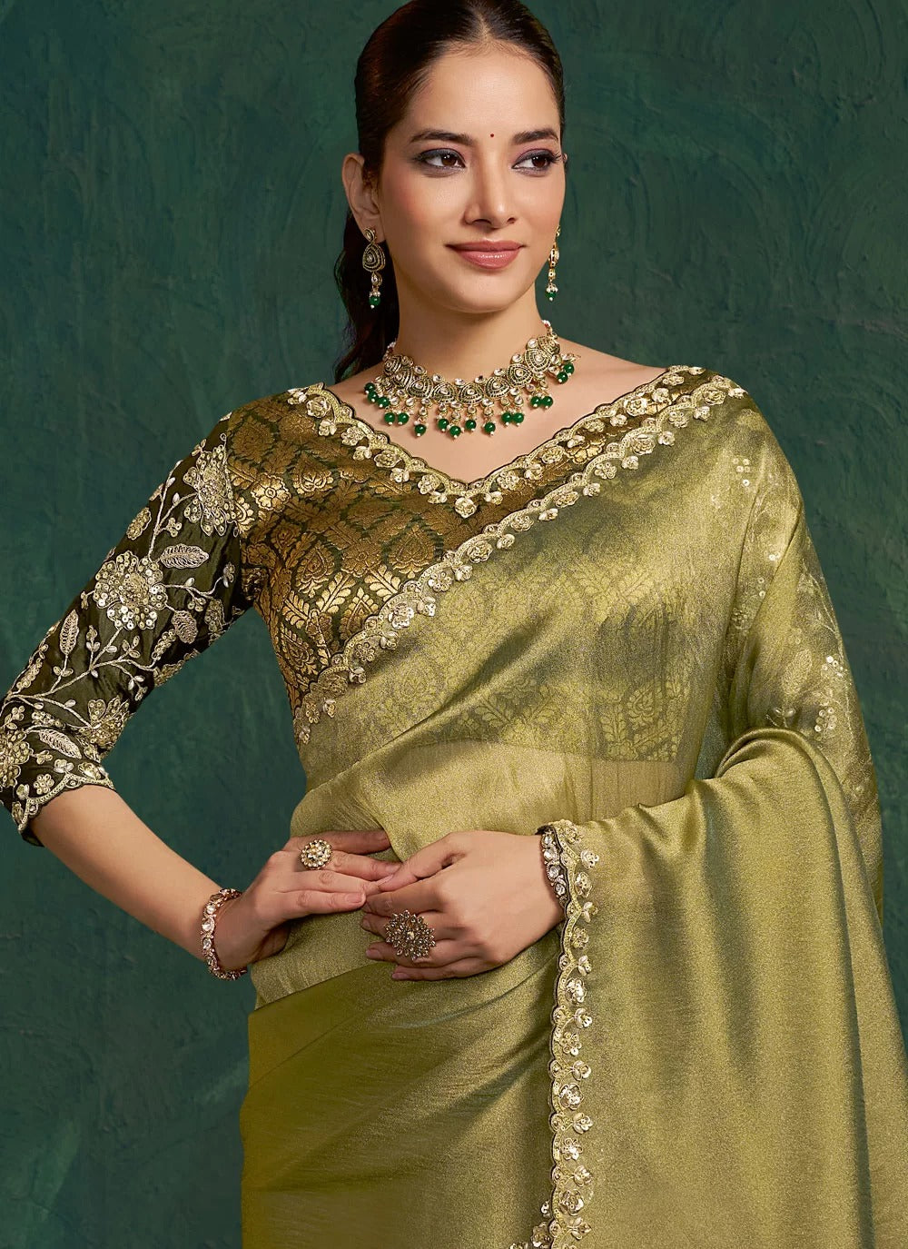 Refined olive green designer indian saree in zari tissue silk
