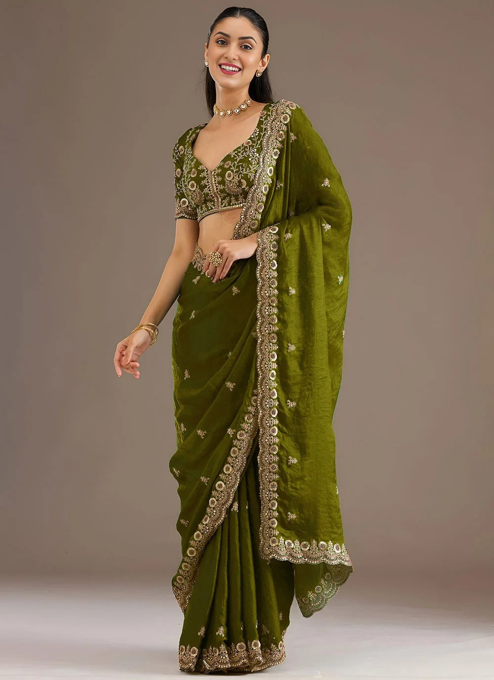 Sophisticated olive green designer tissue silk saree with zari sequins embroidery