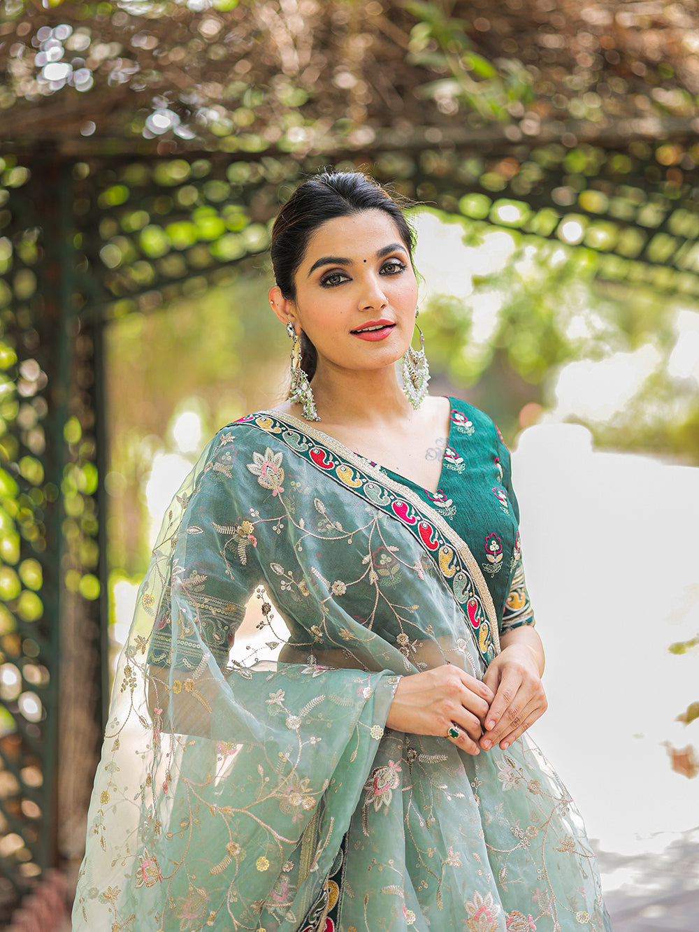 Pista Color Thread Embroidery Work With Lace Border Organza Lehenga Choli