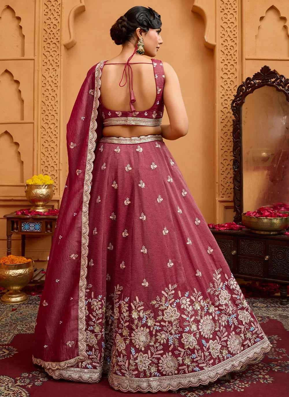Opulent rosegold tissue lehenga with sequin stone embroidery