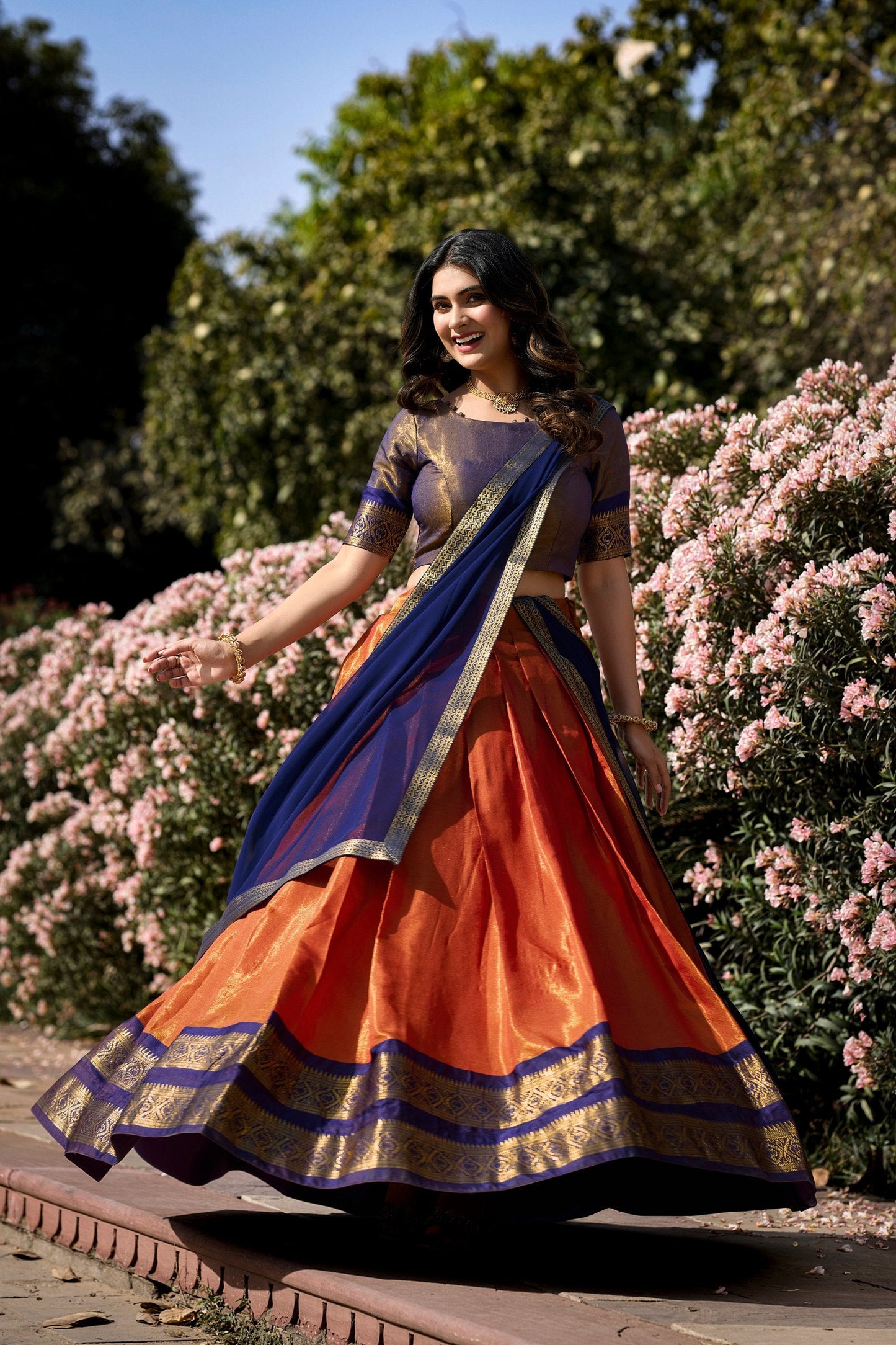 Orange Breathtaking South-Indian Kanchipuram Silk Lehenga Choli Set with Zari Weaving