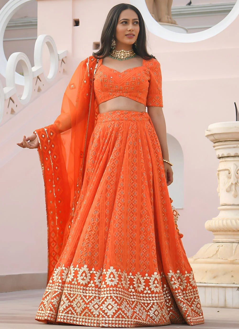 Orange bridesmaid lehenga in georgette with gota patti embroidery