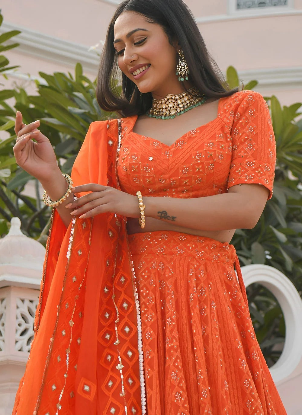 Orange bridesmaid lehenga in georgette with gota patti embroidery