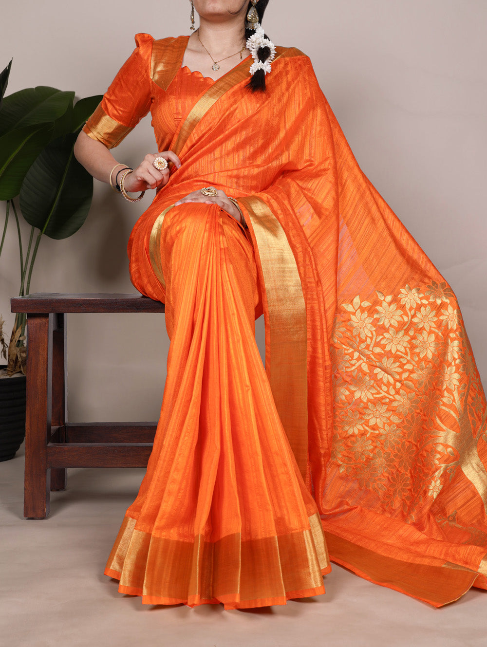 Orange raw silk saree with intricate zari weaving unstitched blouse