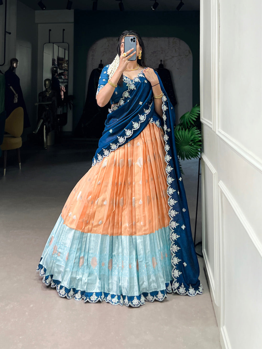 Orange zari kota embroidered lehenga choli with blue vichitra silk dupatta