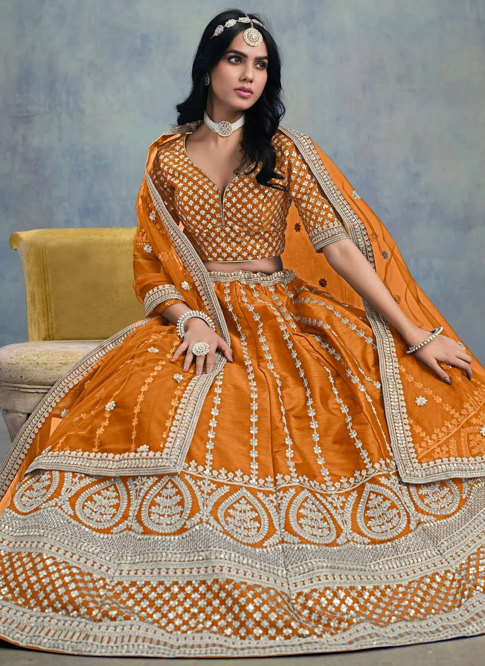 Radiant orange haldi lehenga in art silk with soft net dupatta