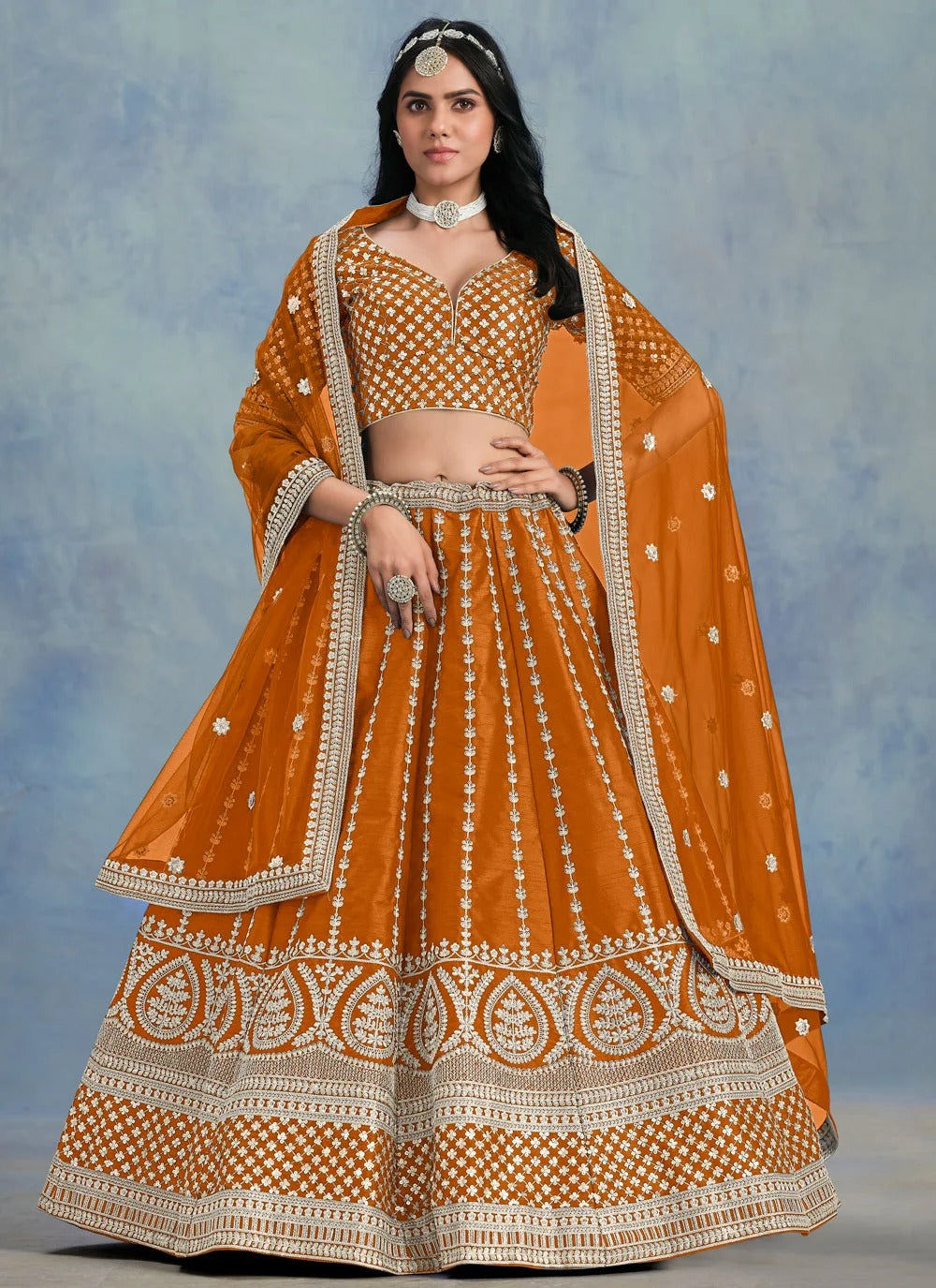 Radiant orange haldi lehenga in art silk with soft net dupatta