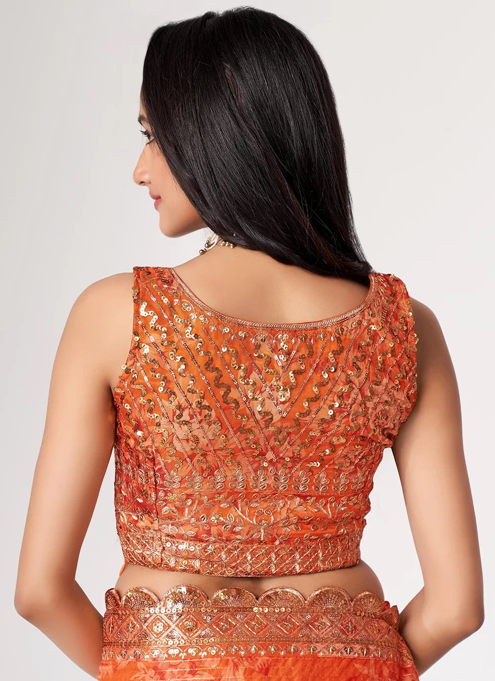 Orange organza sequins embroidered digital print saree
