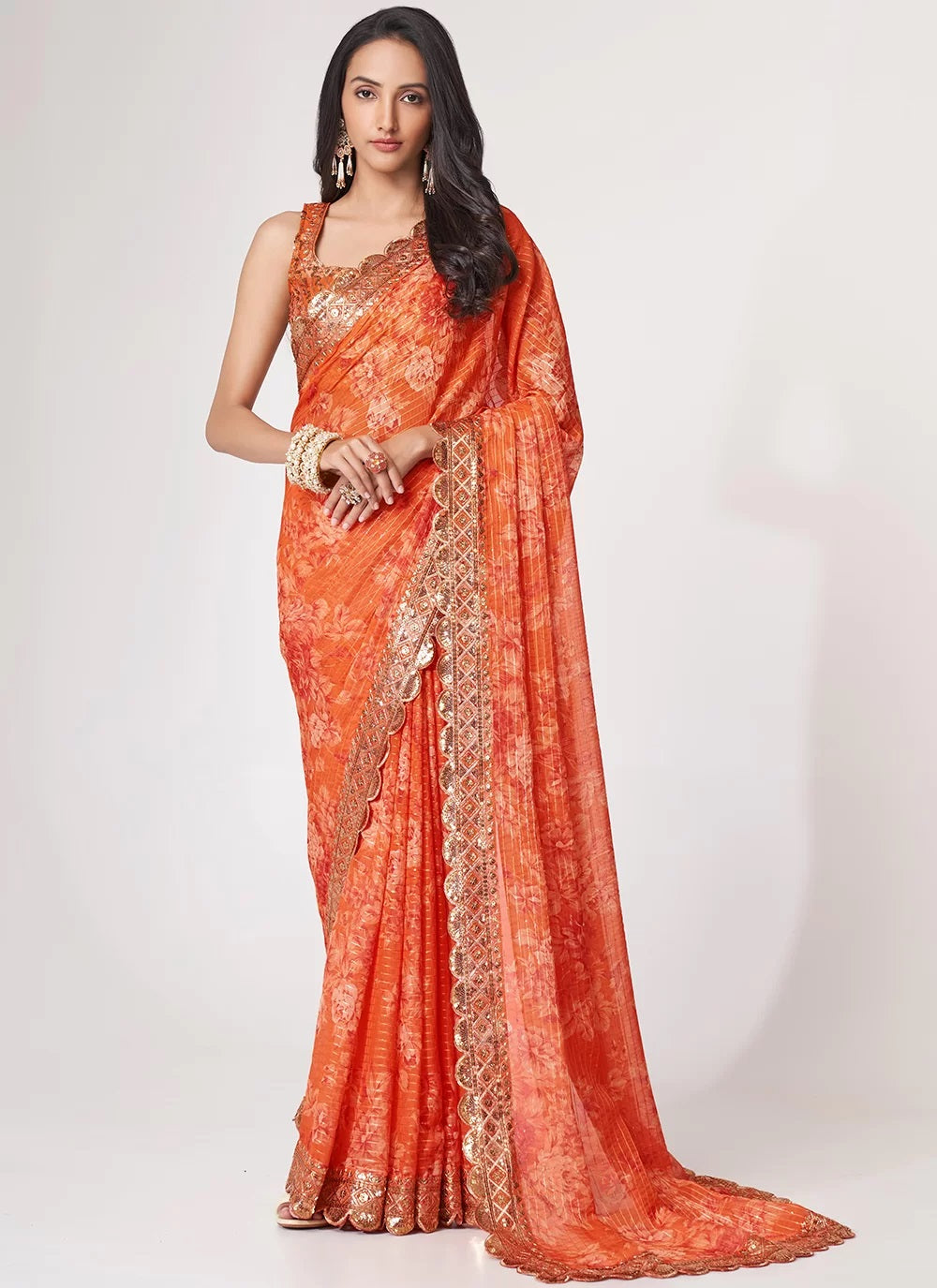 Orange organza sequins embroidered digital print saree