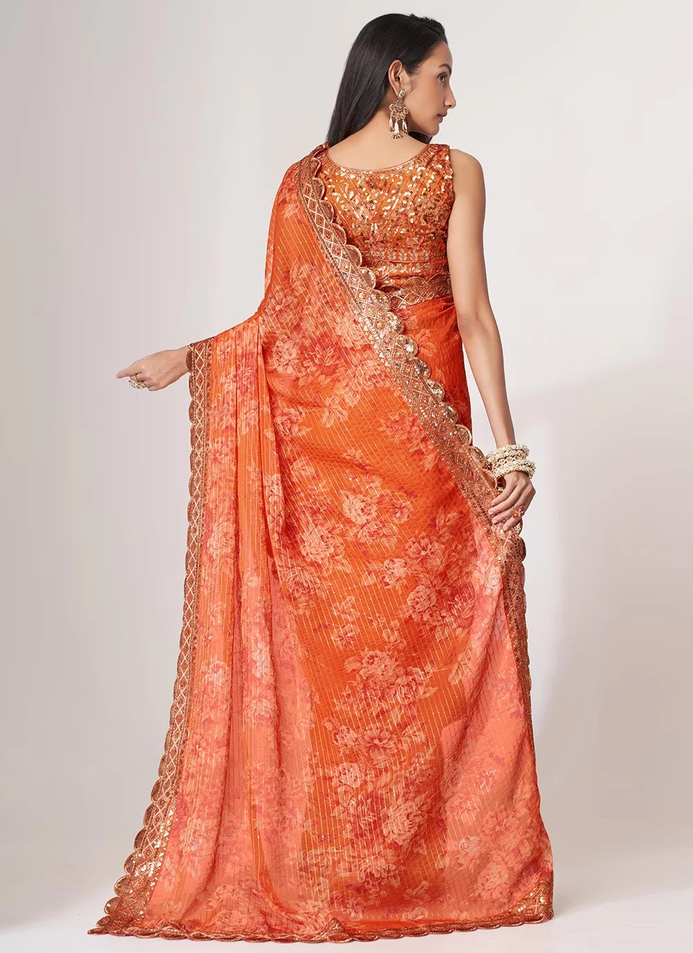 Orange organza sequins embroidered digital print saree