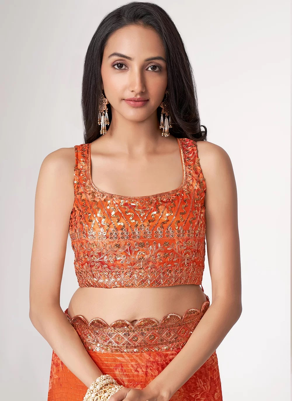 Orange organza sequins embroidered digital print saree