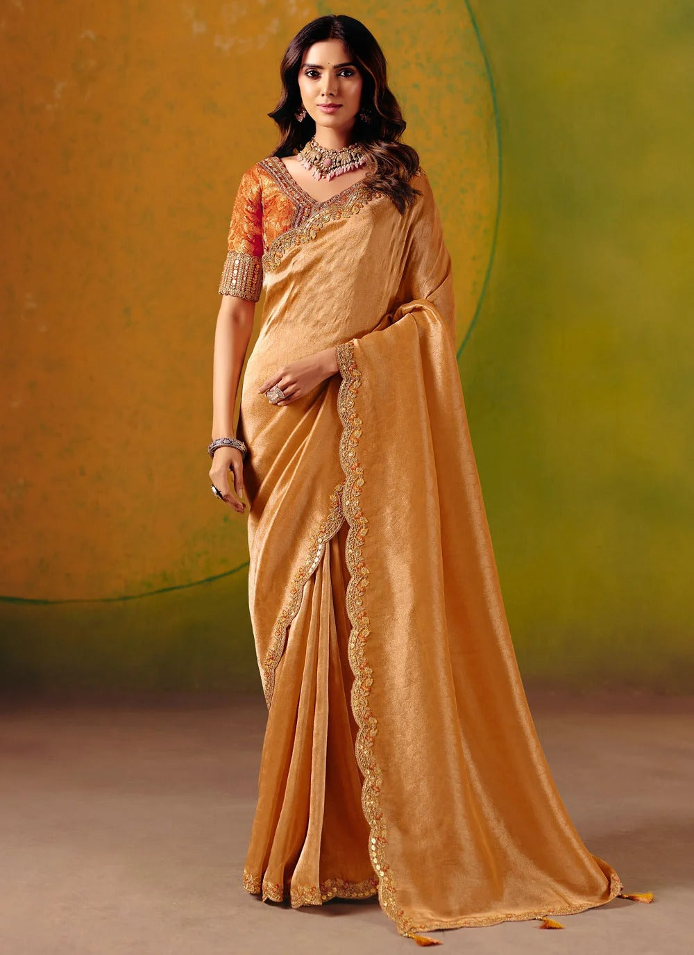 Orange sangeet saree in zari silk with embroidered designer border
