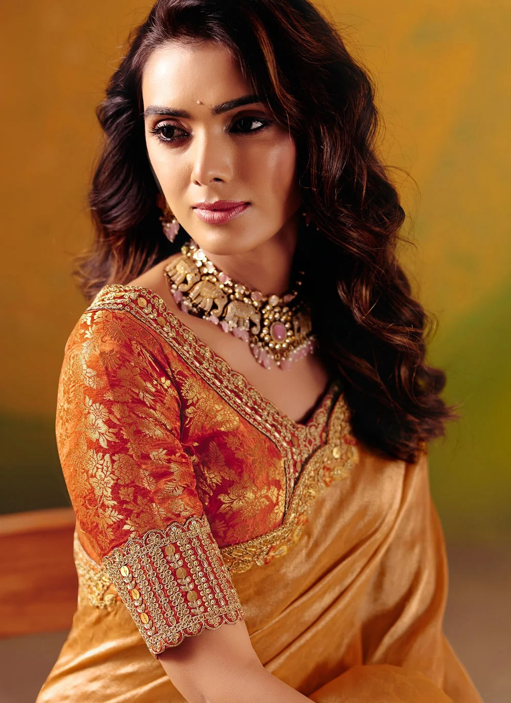 Orange sangeet saree in zari silk with embroidered designer border