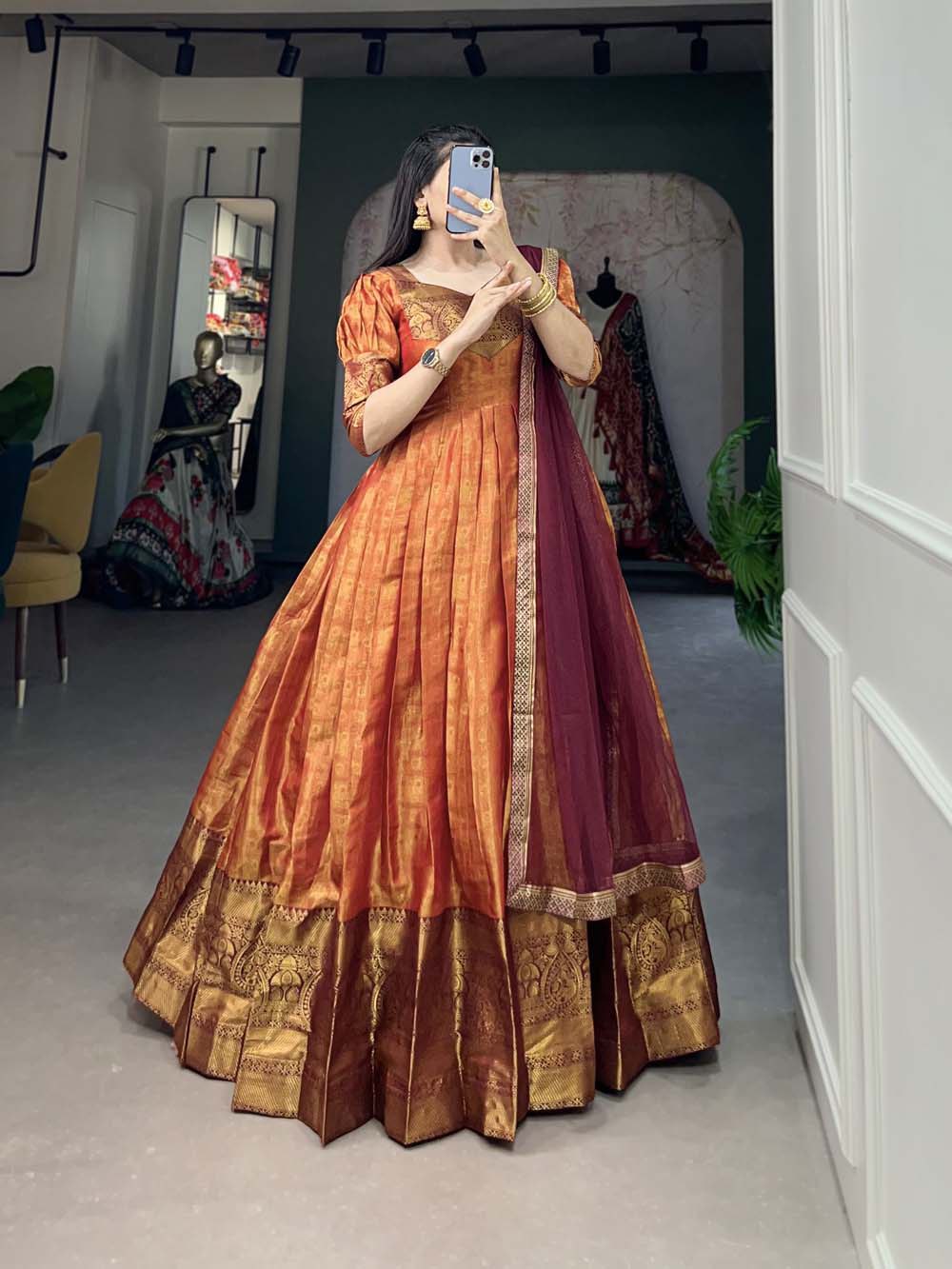 Regal Orange Zari Woven Kanjivaram Gown with Net Dupatta