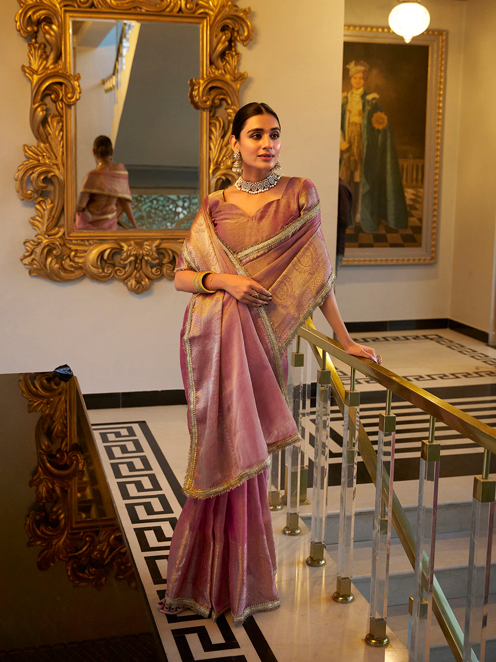 Light pink zari weaving tissue shimmer saree with sequins lace border