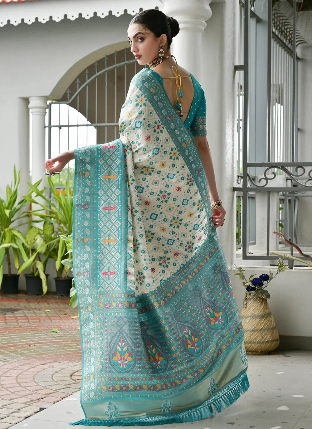 Sea green banarasi silk patola saree with ajrakh zari weaving pallu