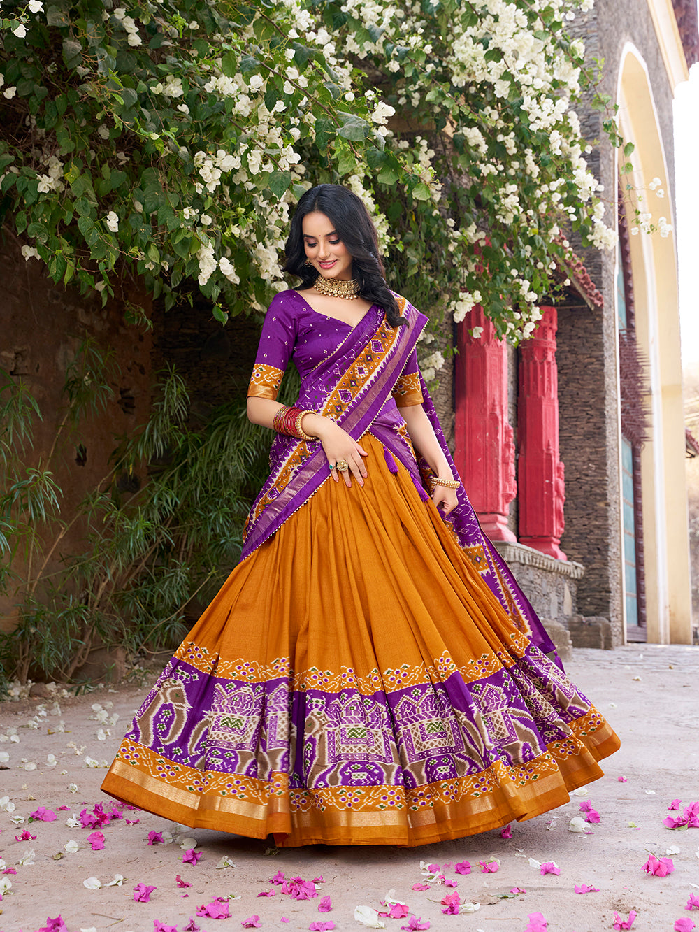Mustard tasar silk lehenga choli with patola print foil work elegance