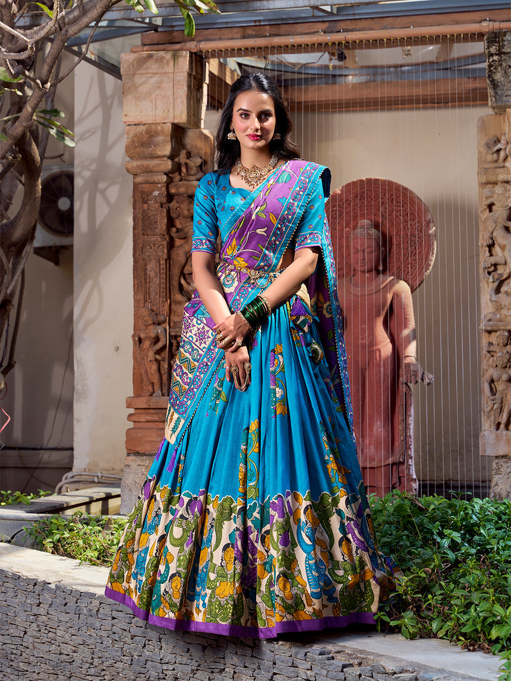 Firozi tussar silk lehenga choli with kalamkari print foil work elegance