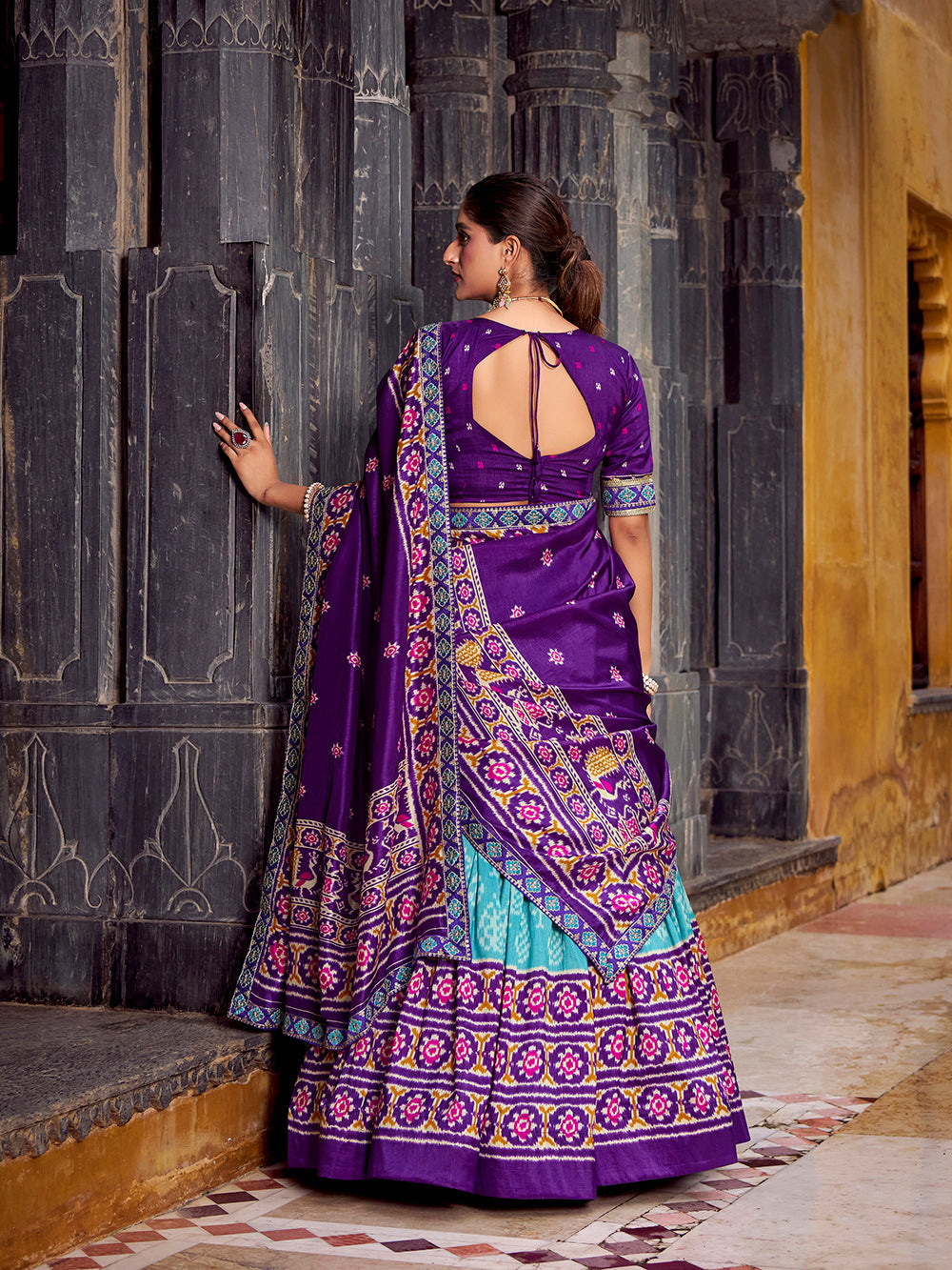 Sky blue tasar silk ikat patola print lehenga choli with purple embroidered blouse dupatta