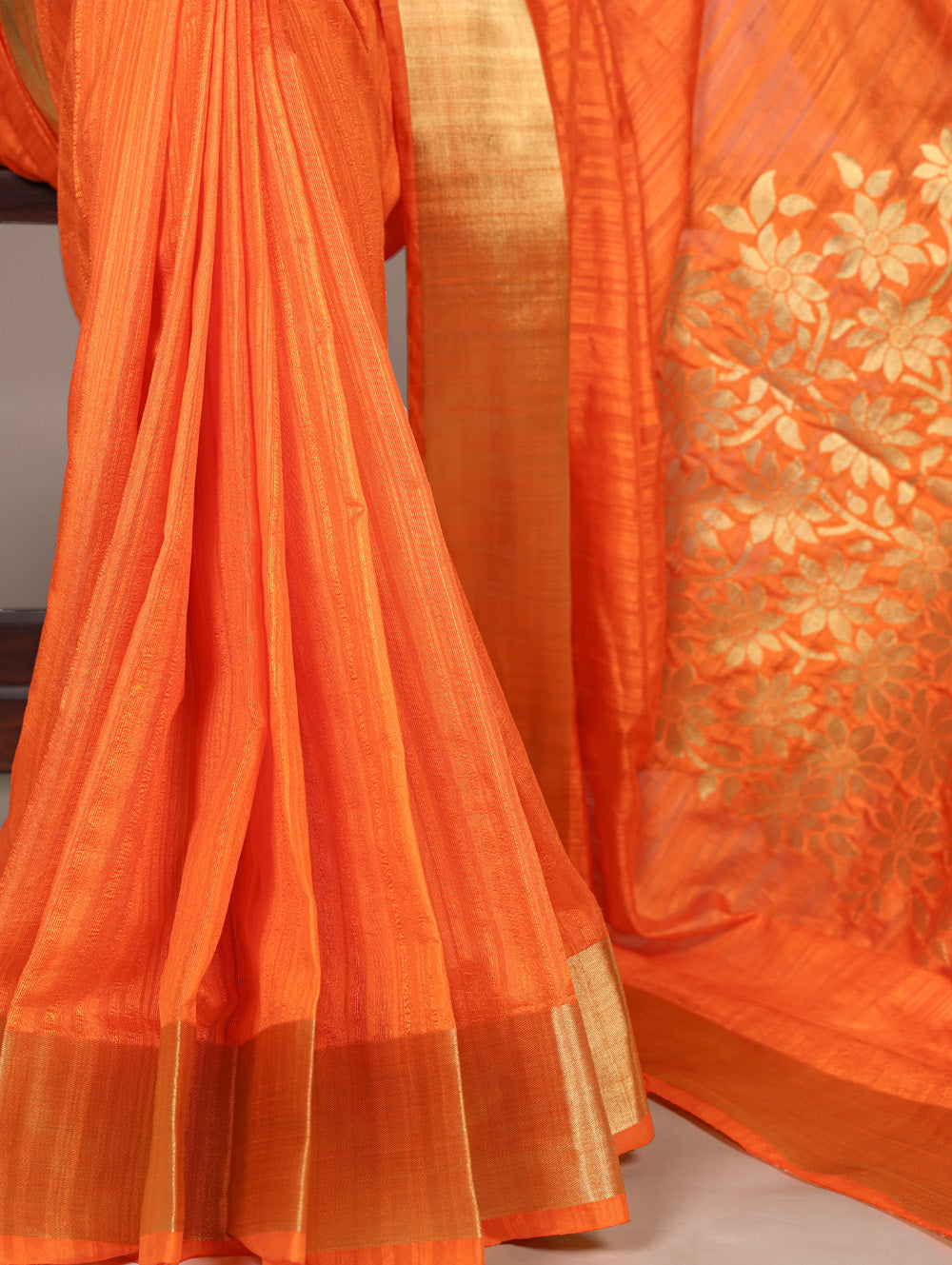Orange raw silk saree with intricate zari weaving unstitched blouse