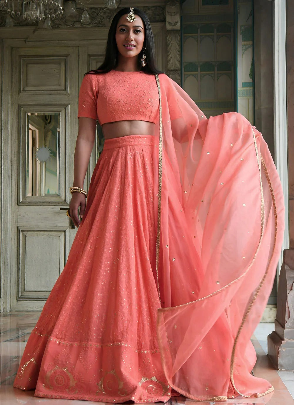 Peach cocktail lehenga in georgette with gota patti embroidery