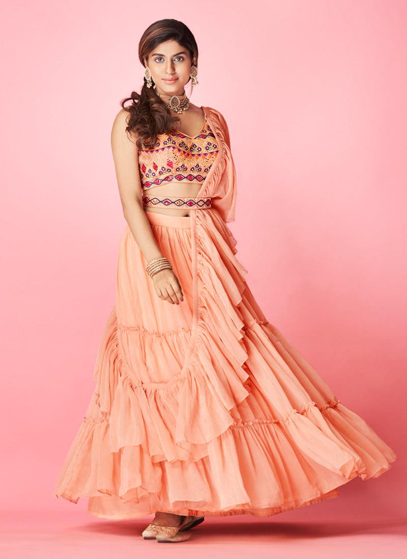 Peach Color Sleeveless Blouse With Chiffon Base Ruffle Lehenga